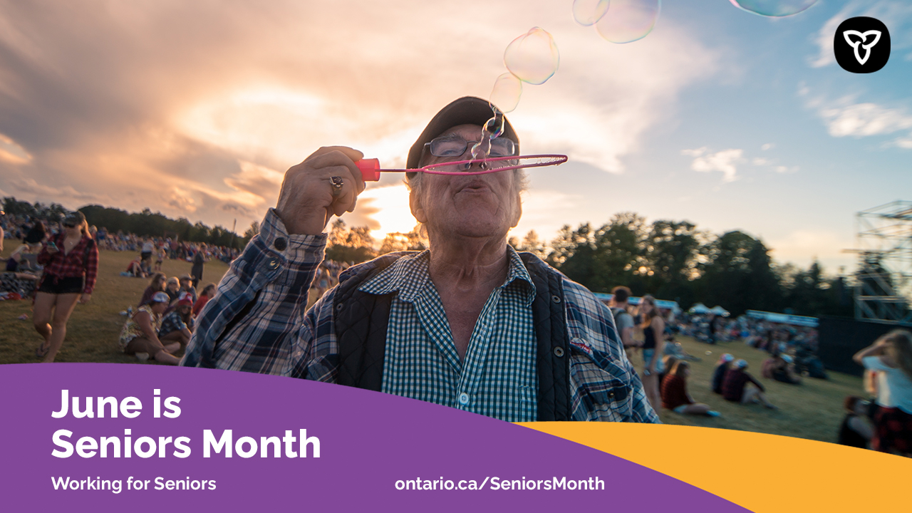 A senior man at an outdoor concert blowing bubbles into the air - graphic from the Ontario government